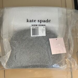 kate spade gray tote with pink hang tag